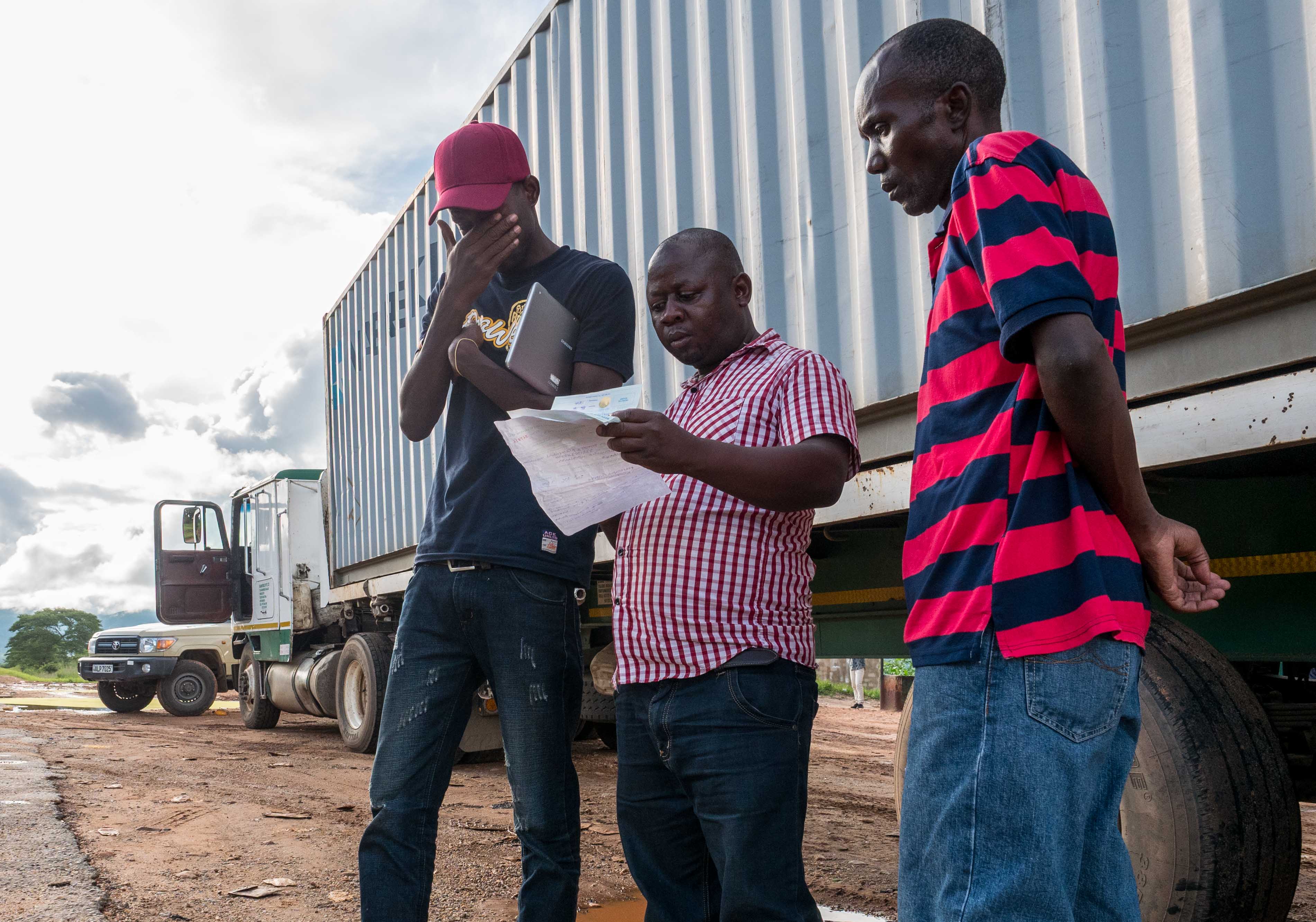 Forestry official checking a driver's paperwork