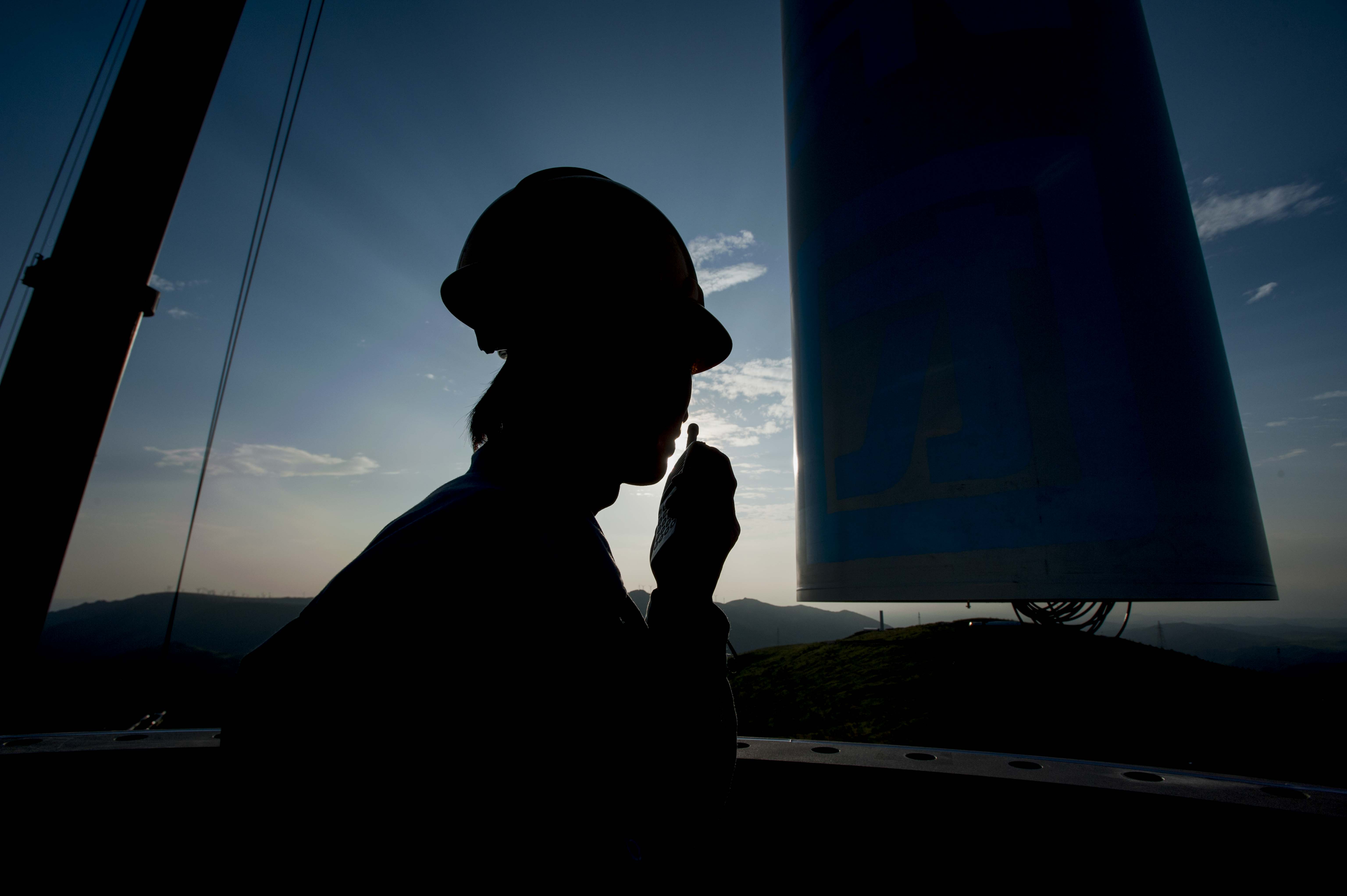 Worker silhouette, turbine housing