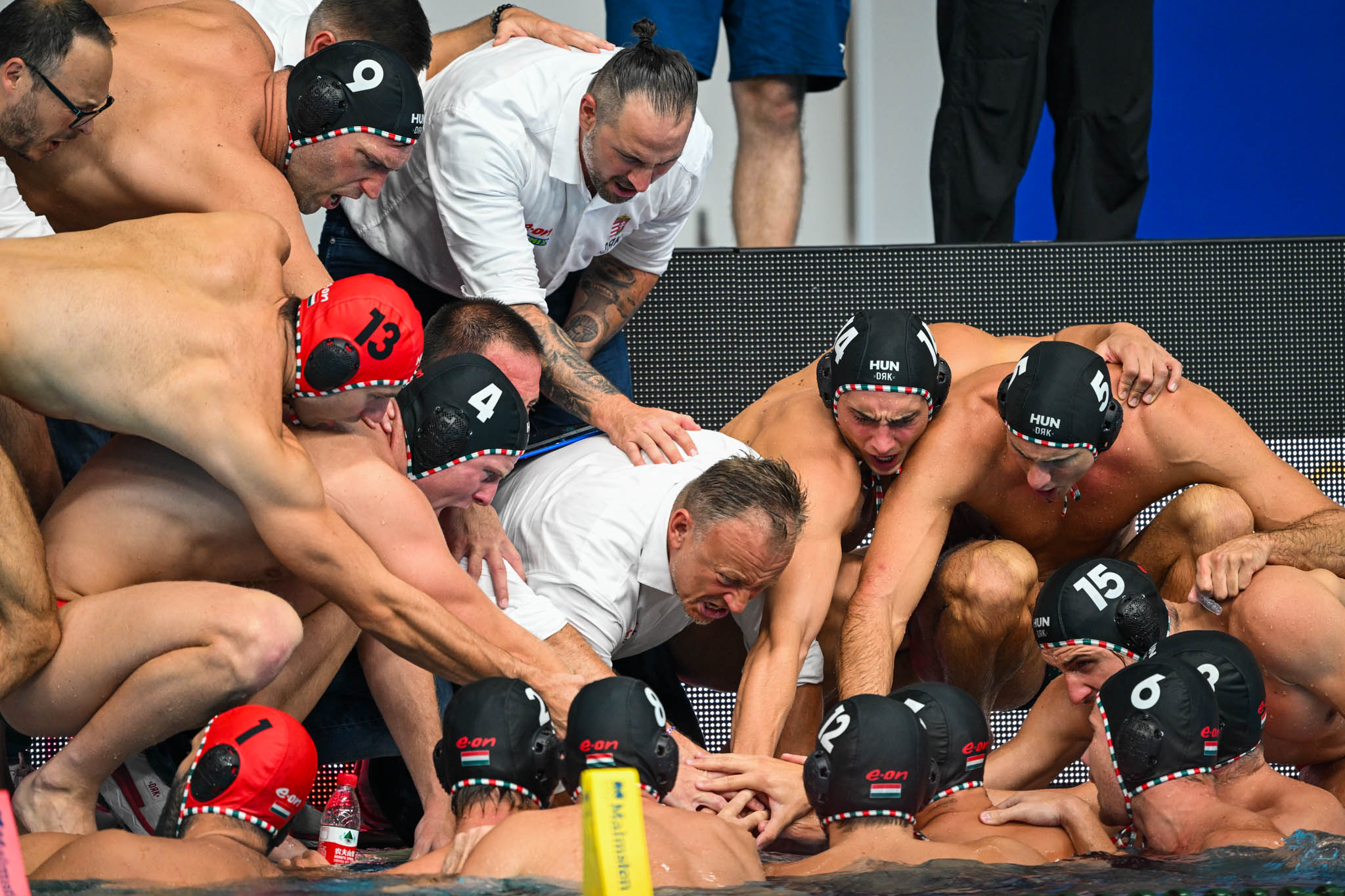 Team huddle with referee